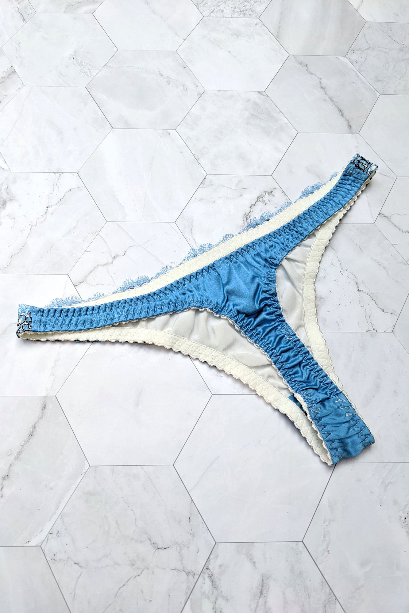 Luxury silk thong panties in ocean blue with white silk lining