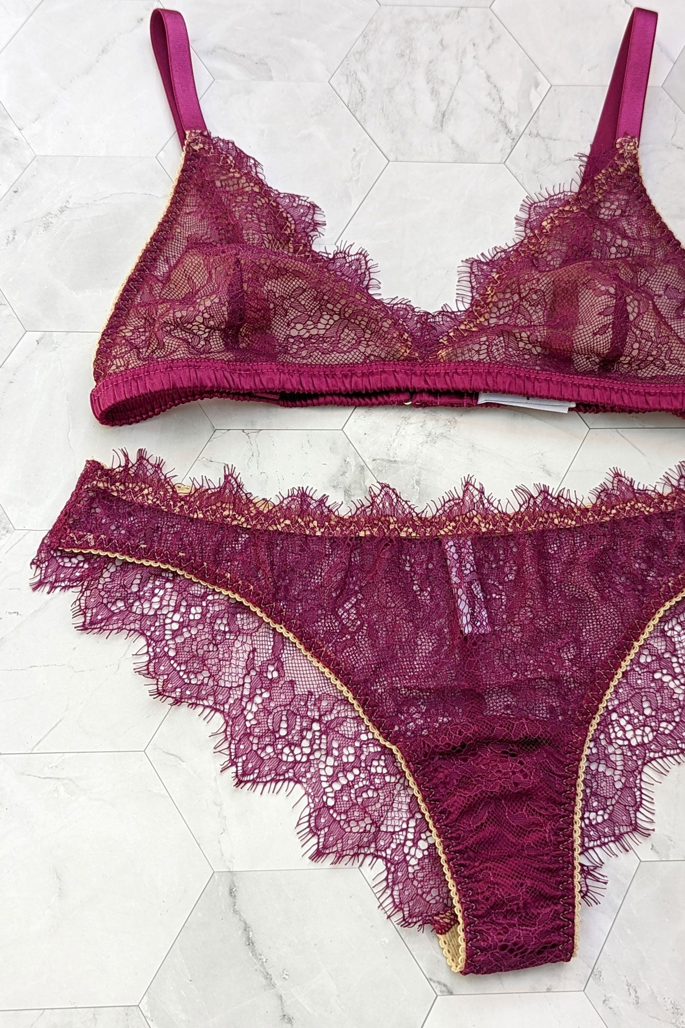 Lace lingerie set for Valentine's Day with magenta pink silk trim