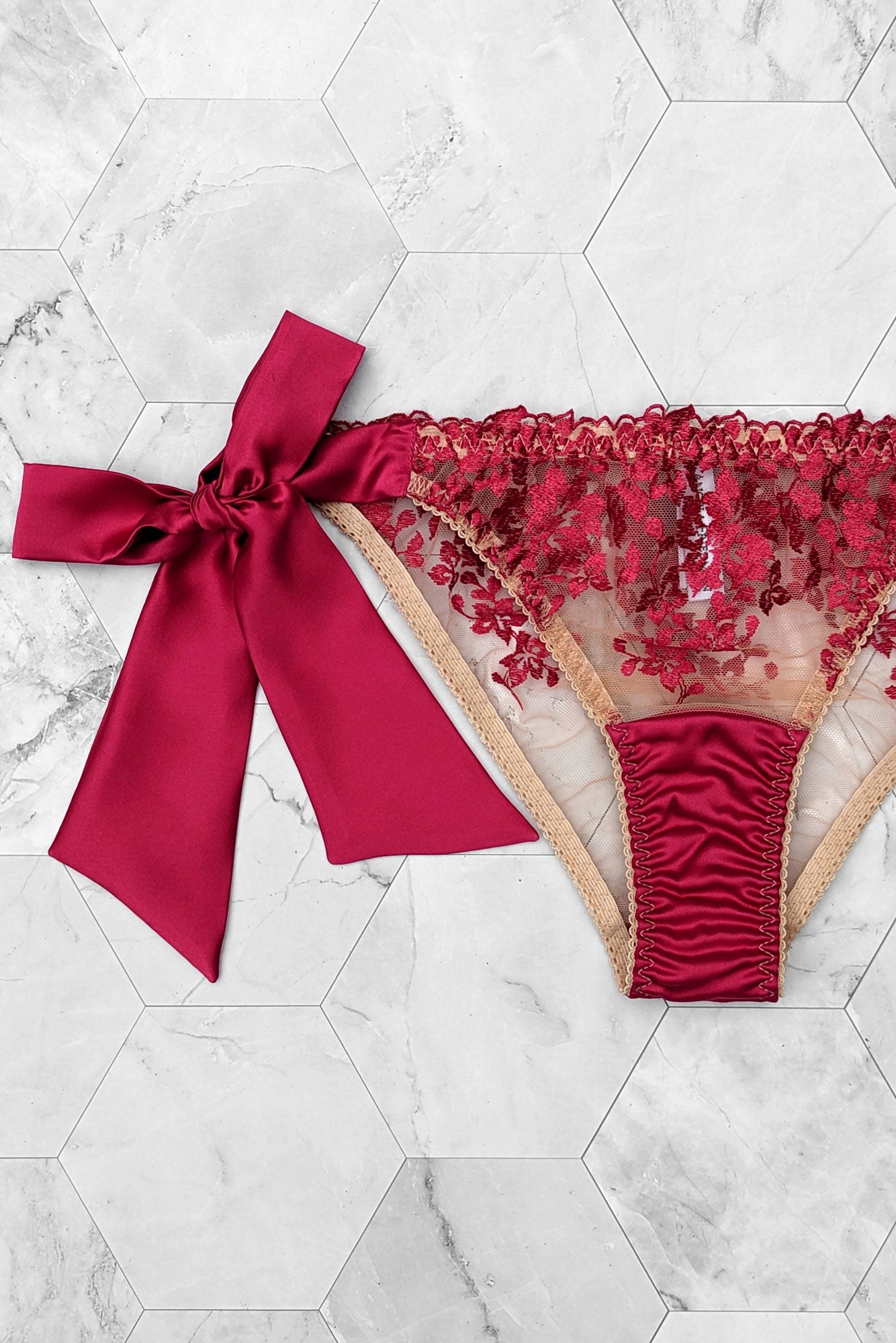 Silk underwear with red lace and satin bows