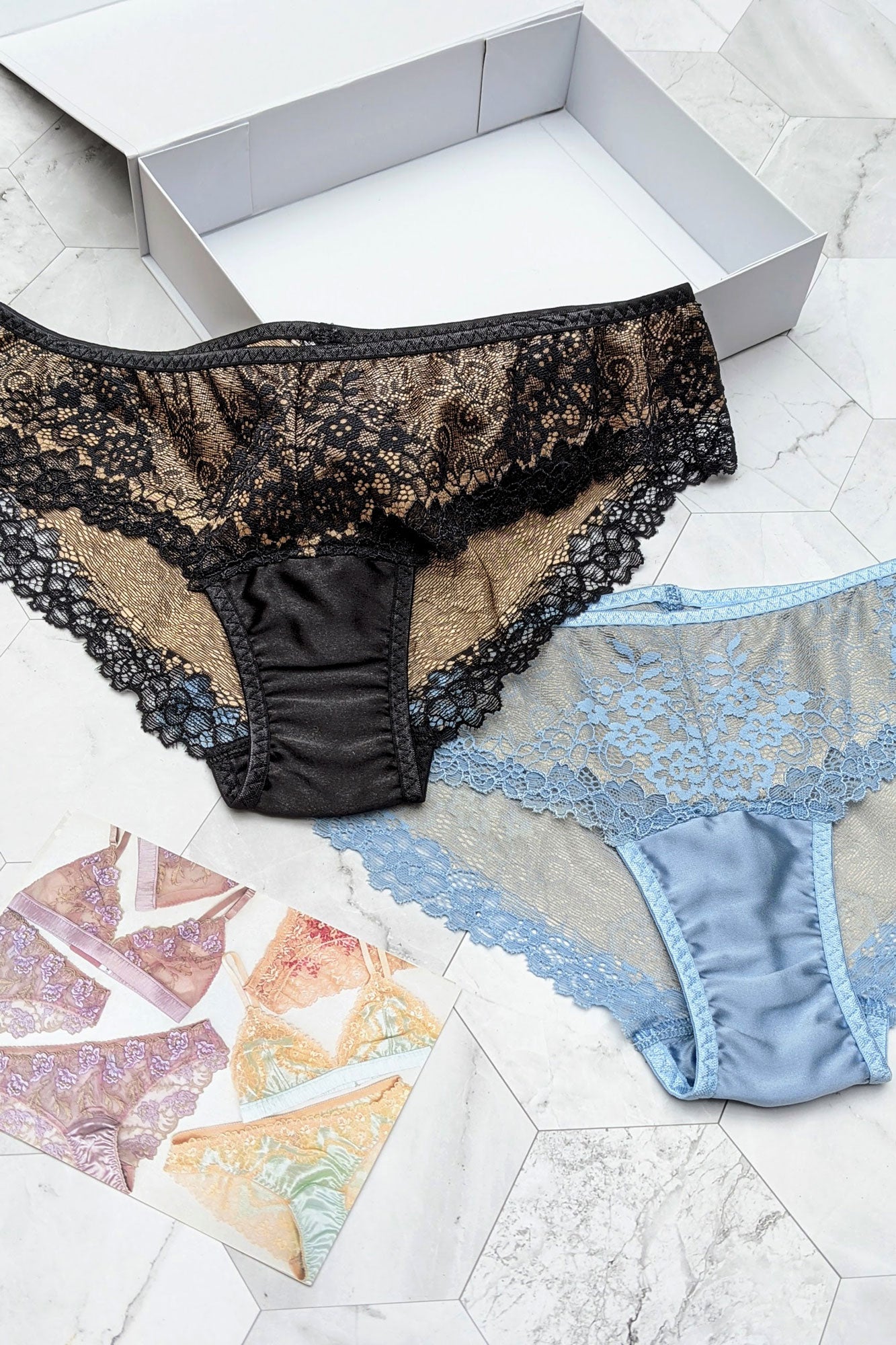 Luxury lingerie set in blue silk and black lace with magenetic gift boxes