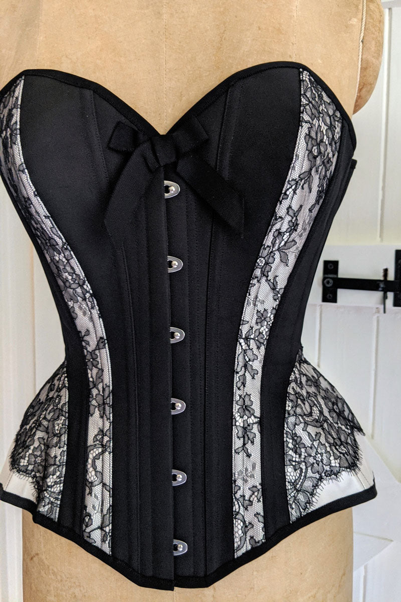 Black silk overbust corset with french lace applique, steel boning, and English coutil lining