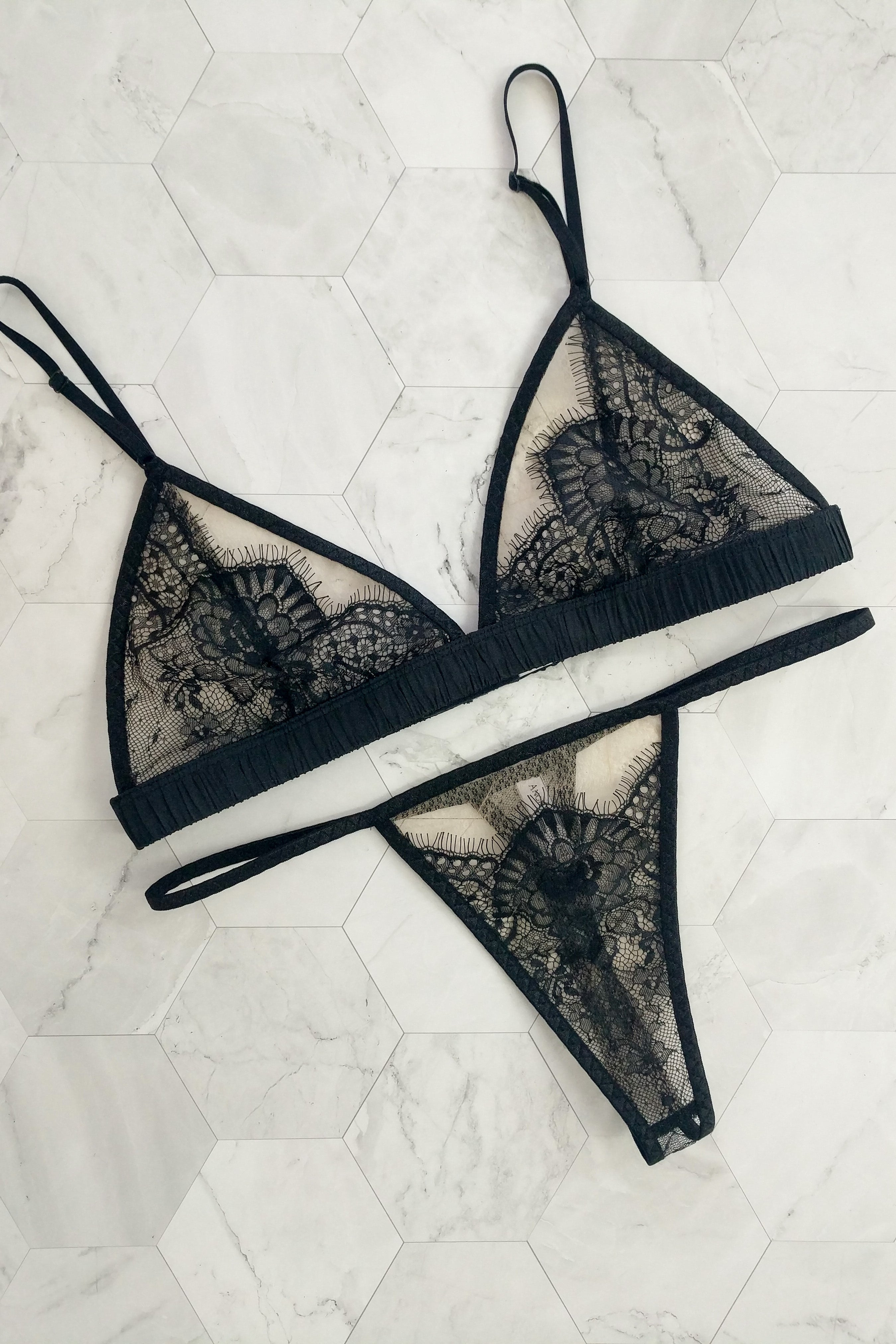 Designer black lace lingerie set with bralette and thong knickers