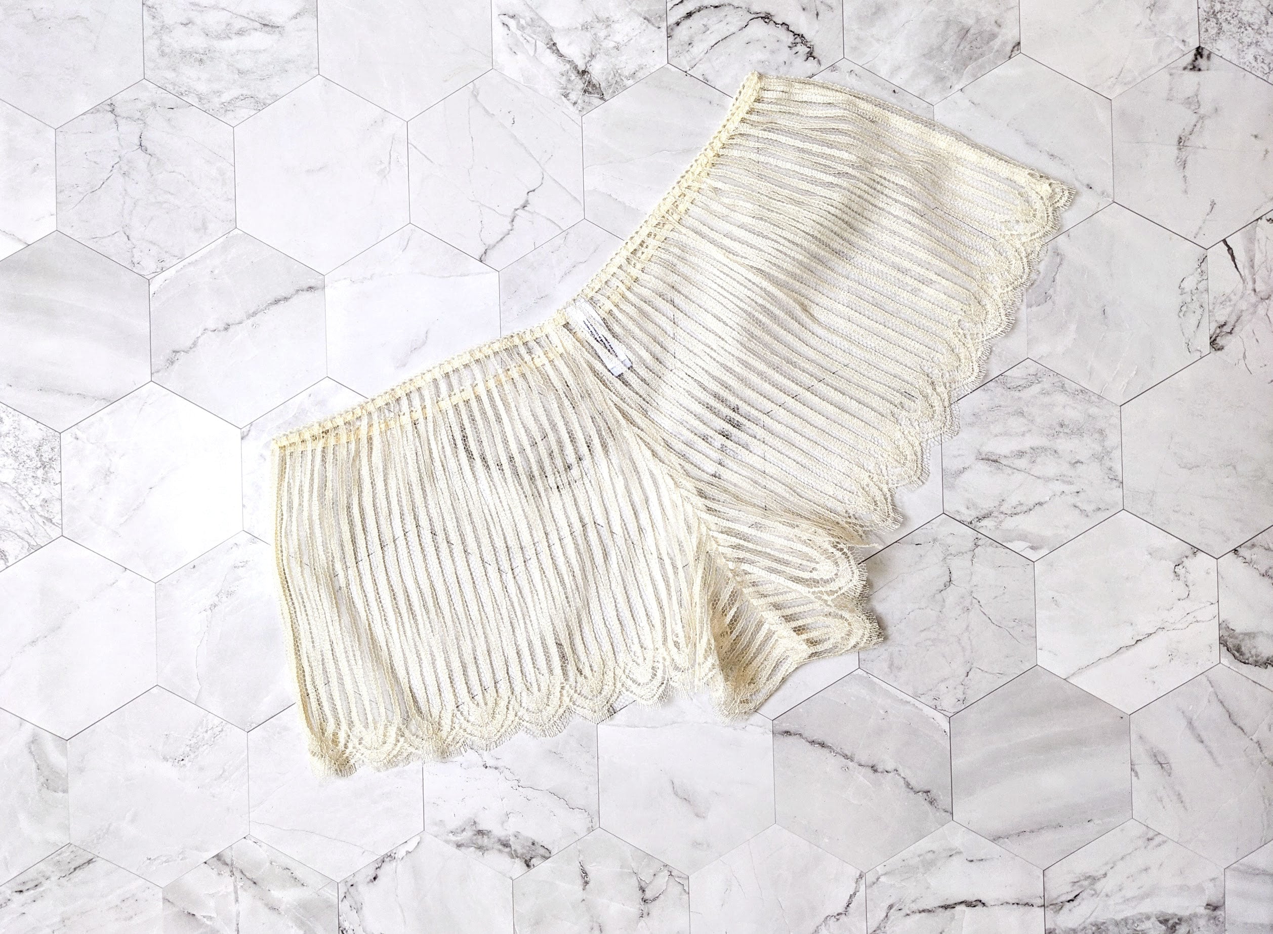 Off white lace tap pants with scalloped eyelash edges