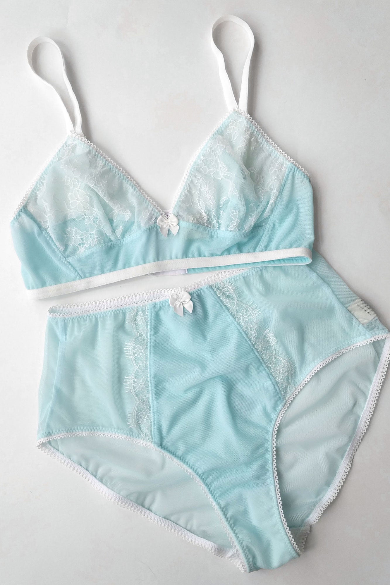 Light blue cute delicate lacework bra on transparent background